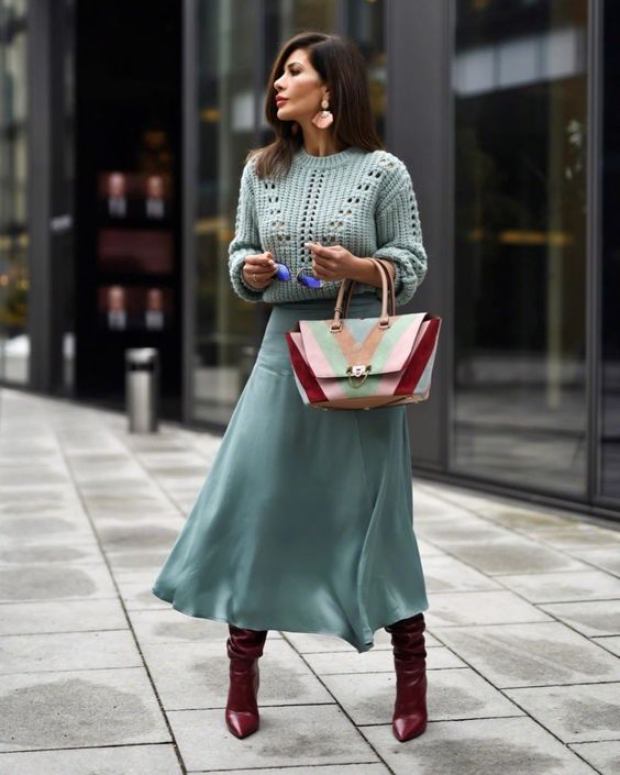 Light green knit sweater with a seafoam green silk skirt